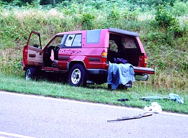 Abandoned vehicle discovered along roadside.